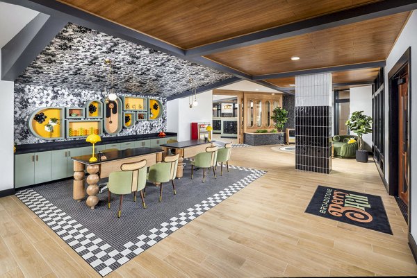 Stylish clubhouse with modern seating and decor in Broadstone Berry Hill Apartments lobby