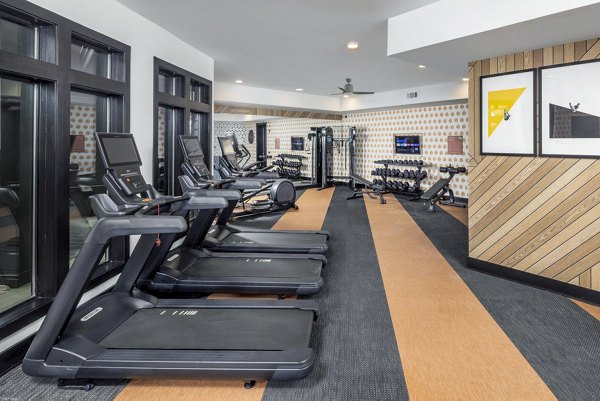 State-of-the-art fitness center with modern equipment at Broadstone Berry Hill Apartments