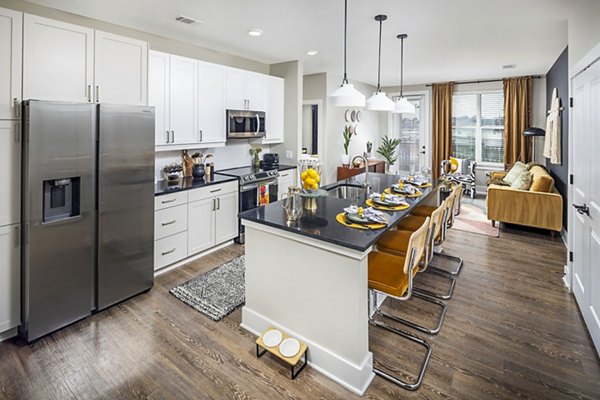 Modern kitchen with stainless steel appliances in Broadstone Berry Hill Apartments