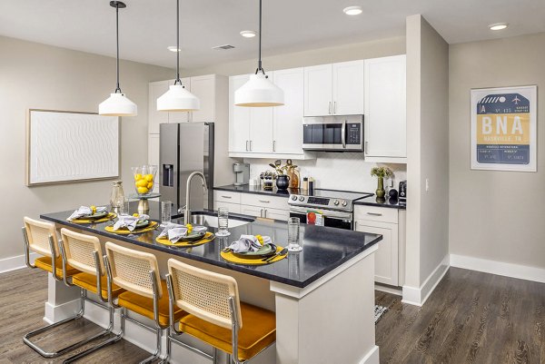 Modern kitchen featuring sleek appliances and granite countertops at Broadstone Berry Hill Apartments, a luxury Greystar property in Nashville