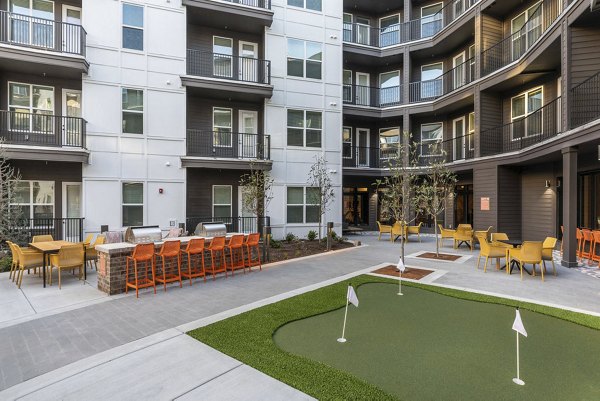Putting green at Broadstone Berry Hill offering leisure activities for residents