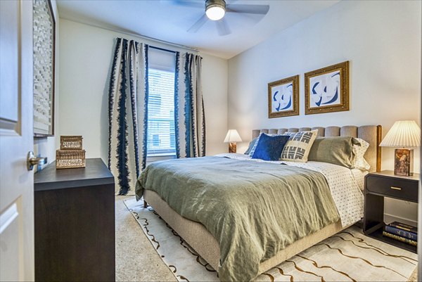 bedroom at Alexan Cathedral Arts Apartments