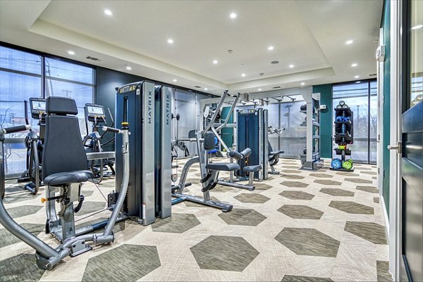 fitness center at Alexan Cathedral Arts Apartments