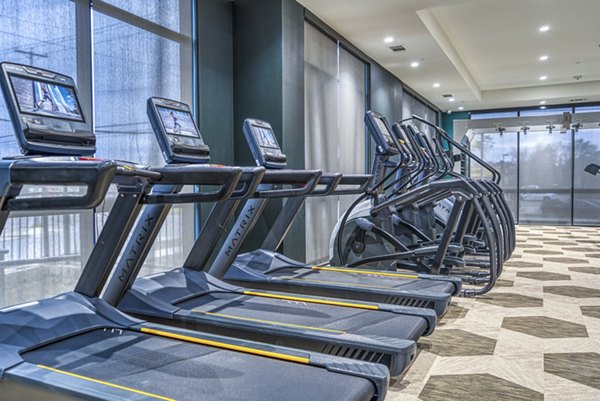 fitness center at Alexan Cathedral Arts Apartments