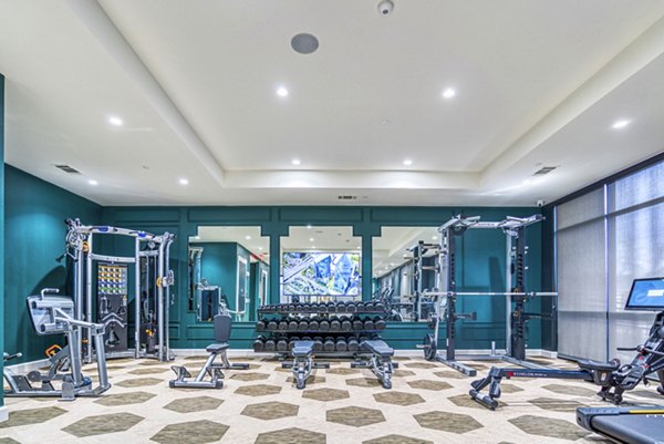 fitness center at Alexan Cathedral Arts Apartments