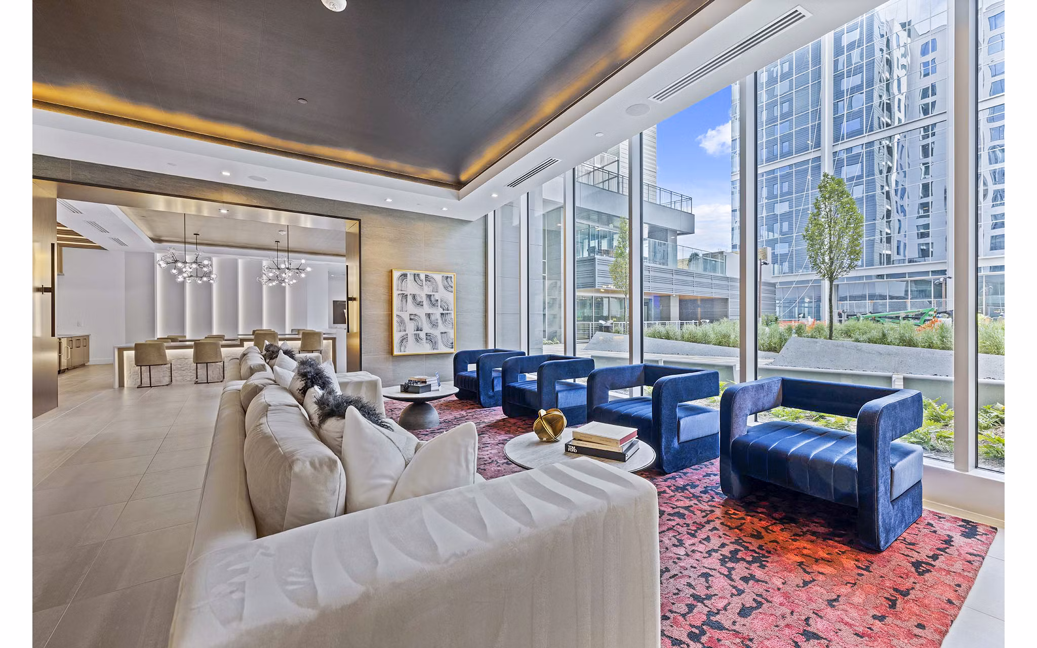 Modern clubhouse with elegant decor at Novel Midtown Apartments, offering luxury amenities for social gatherings and relaxation