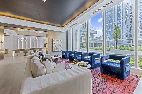 Modern clubhouse with elegant decor at Novel Midtown Apartments, offering luxury amenities for social gatherings and relaxation
