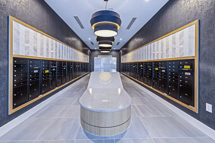 Clubhouse mail room featuring modern design at Novel Midtown Apartments