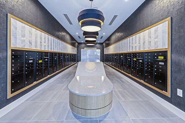 Clubhouse mail room featuring modern design at Novel Midtown Apartments