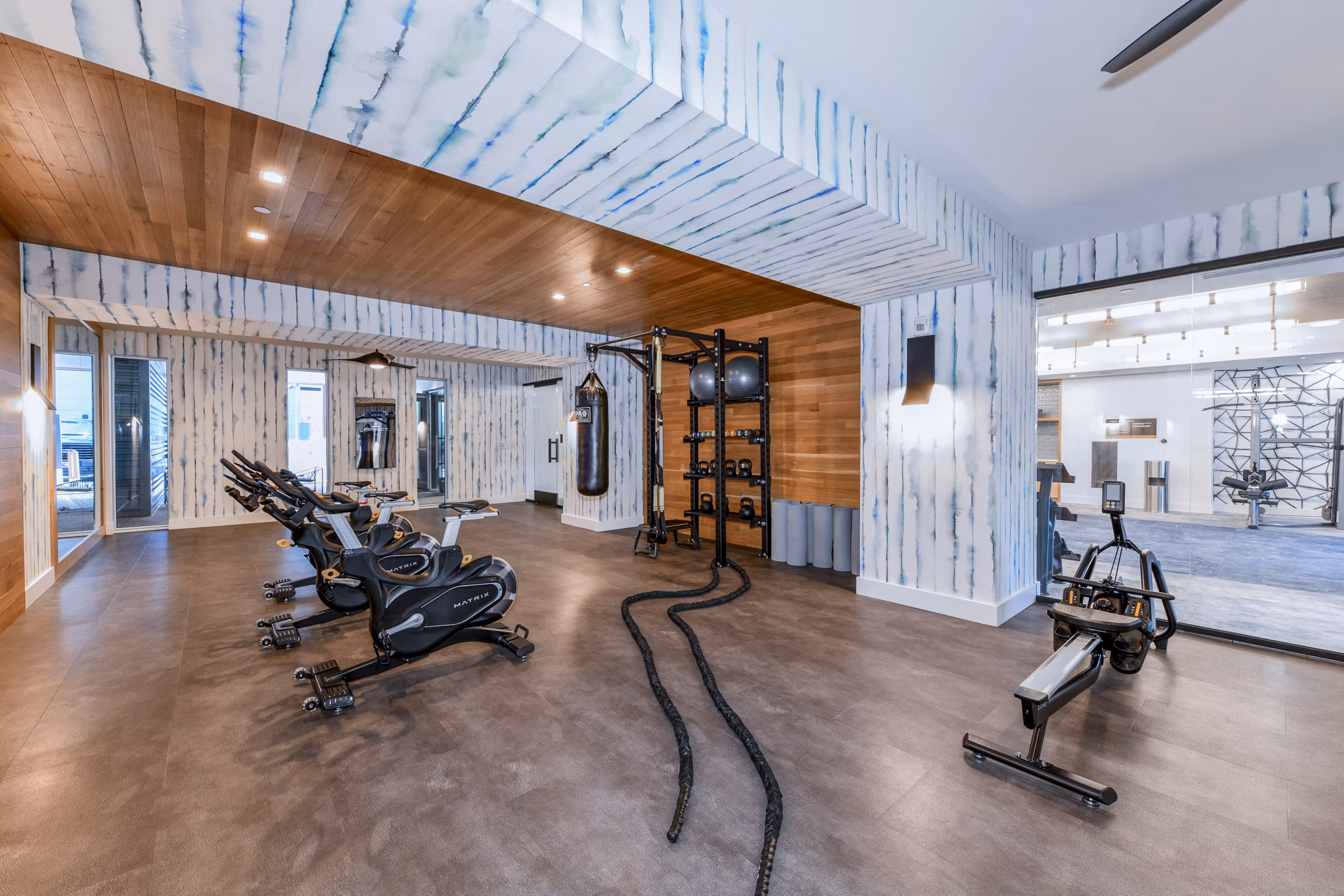 State-of-the-art fitness center with modern equipment at Novel Midtown Apartments