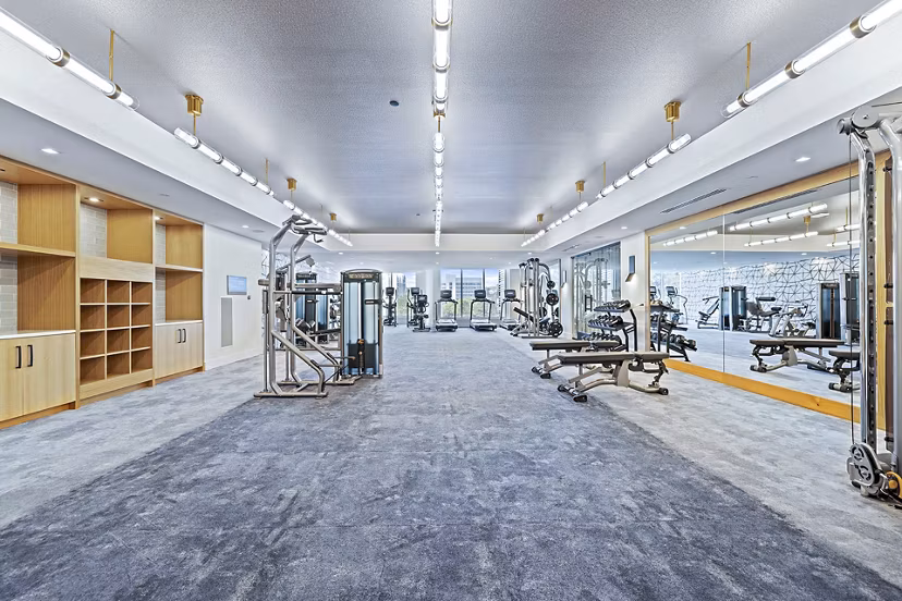 State-of-the-art fitness center at Novel Midtown Apartments with modern equipment and spacious workout area