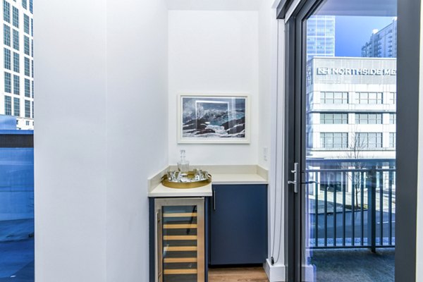 Spacious living room with modern decor in Novel Midtown Apartments, featuring luxury finishes for a comfortable lifestyle