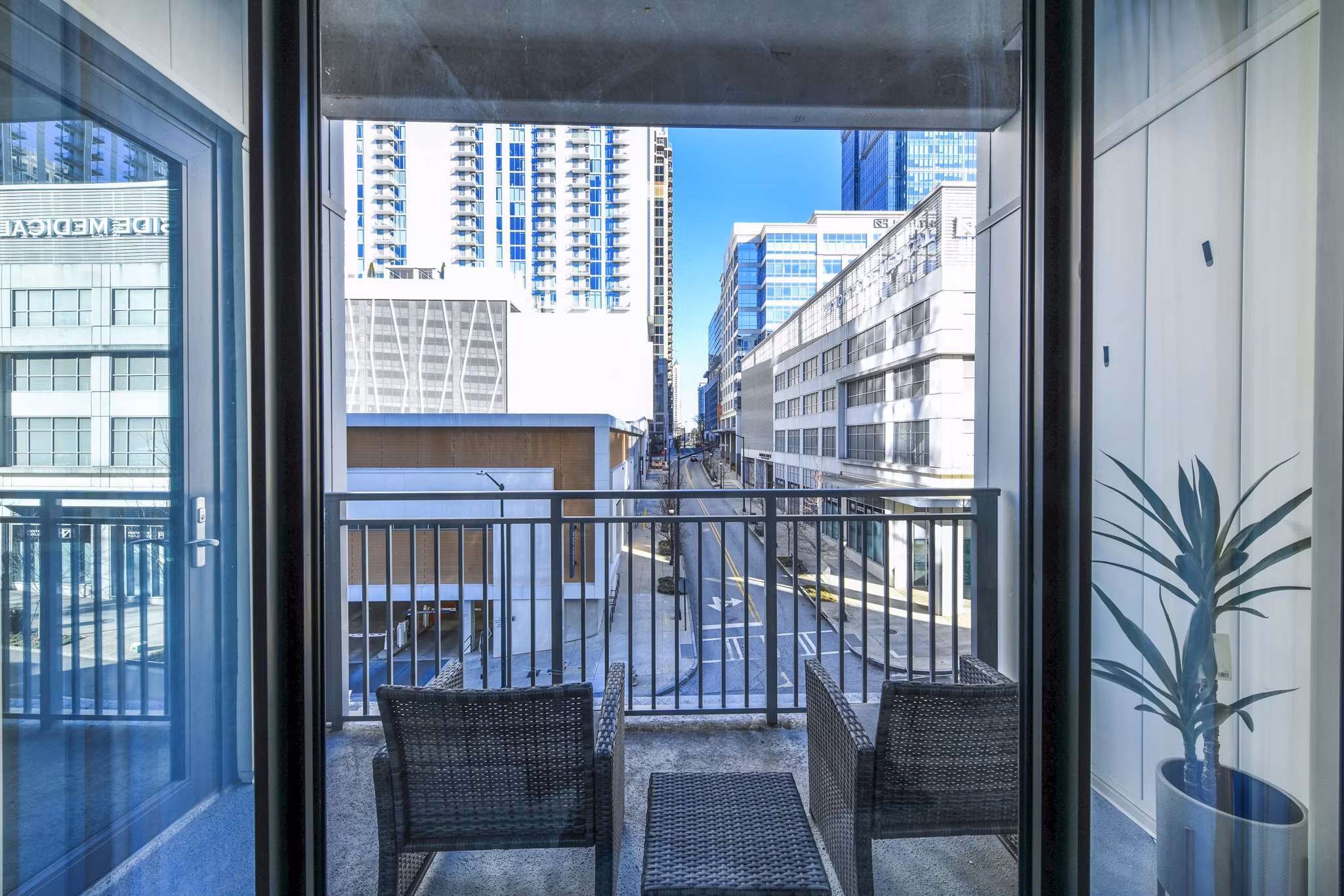 Cozy patio at Novel Midtown Apartments featuring stylish outdoor furniture