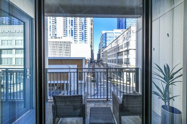 Cozy patio at Novel Midtown Apartments featuring stylish outdoor furniture
