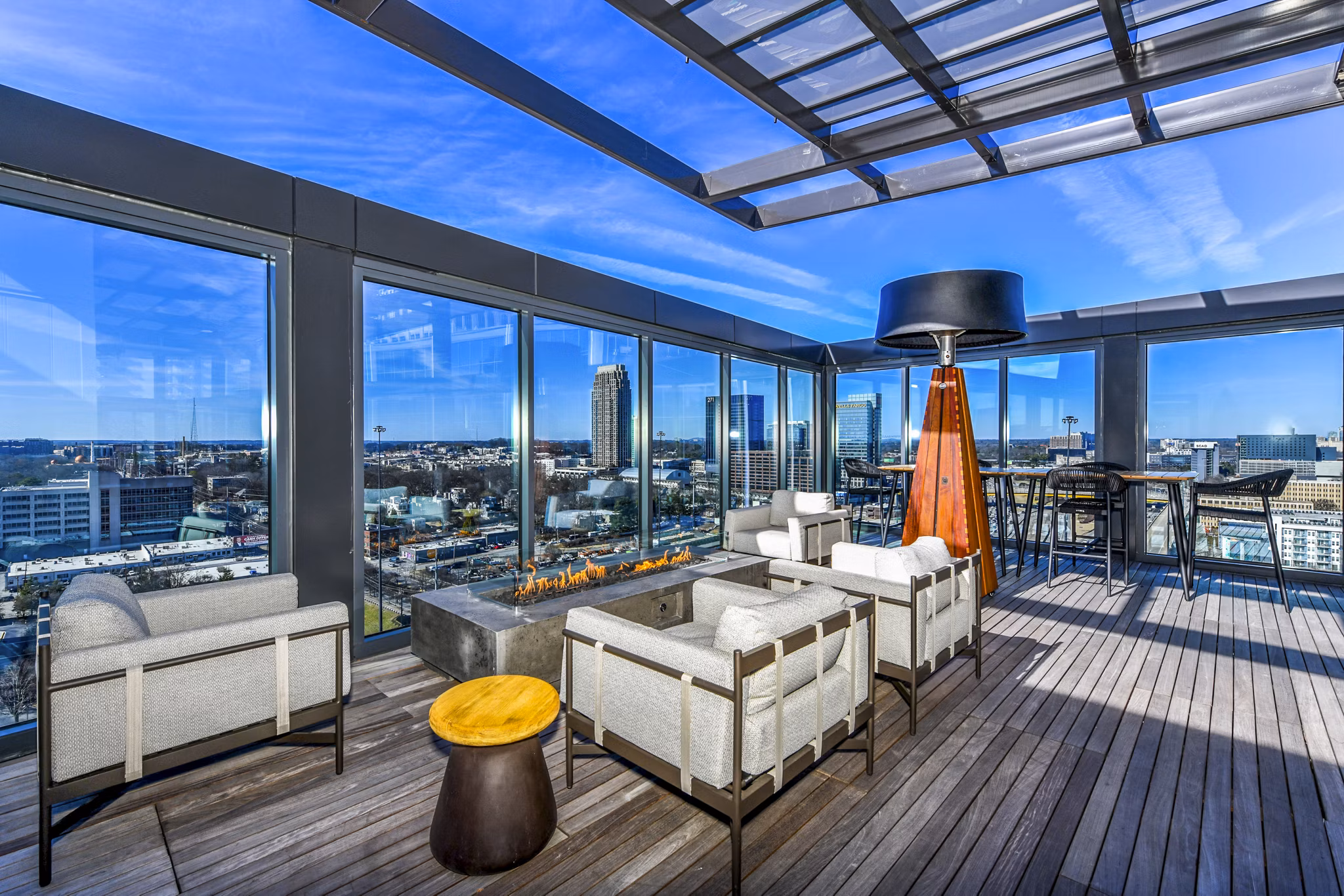 Cozy fire pit on a modern patio at Novel Midtown Apartments, a luxury living experience
