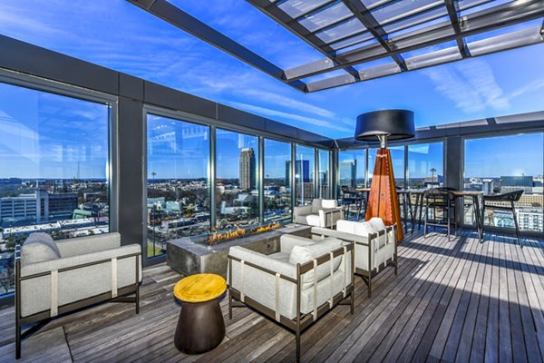 Cozy fire pit on a modern patio at Novel Midtown Apartments, a luxury living experience