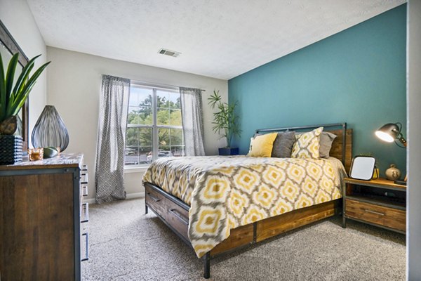 Cozy bedroom with modern decor at Bridgewater Apartments