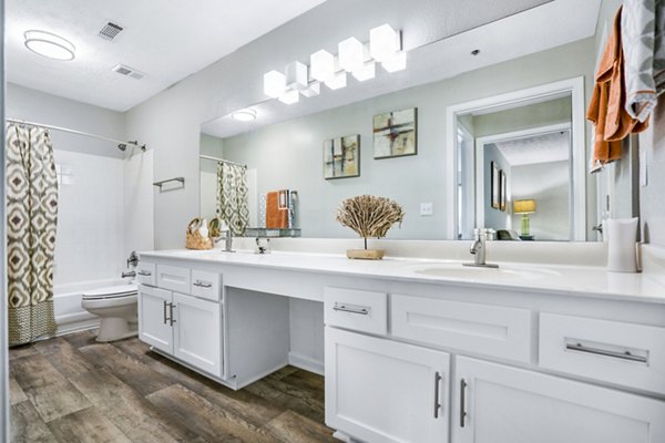 Modern bathroom with sleek fixtures at Bridgewater Apartments, offering luxury living spaces in a serene environment