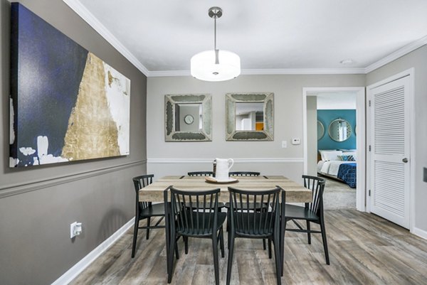 Dining room with elegant decor and modern furnishings at Bridgewater Apartments, a luxury community offering premium living spaces