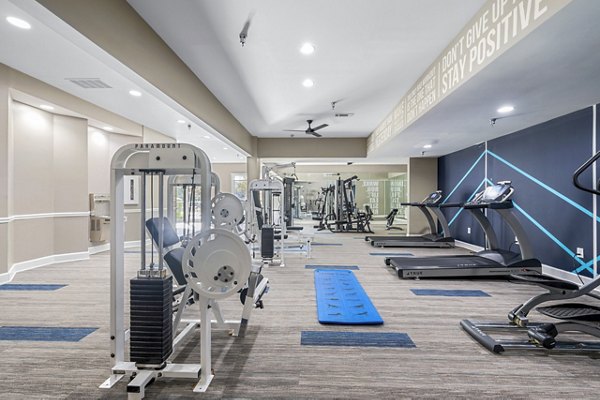 Modern fitness center with state-of-the-art equipment at Bridgewater Apartments in a luxury community setting