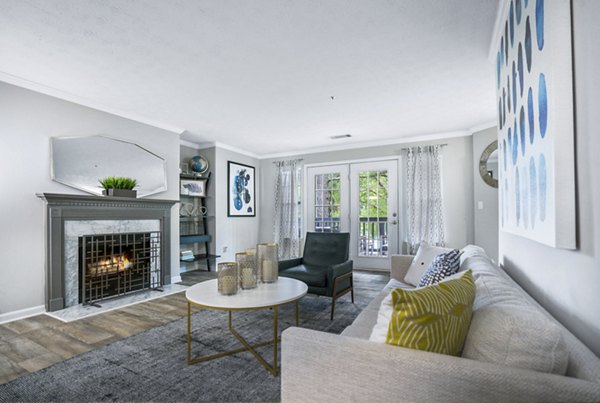 Cozy living room with modern decor at Bridgewater Apartments: luxury home by Greystar