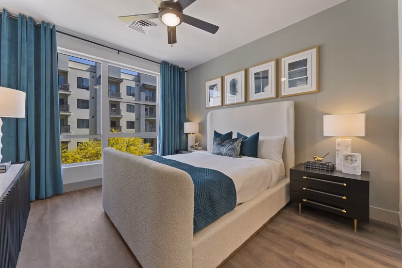 Cozy bedroom with stylish decor at Soltra at Kierland Apartments: Luxury living in Scottsdale