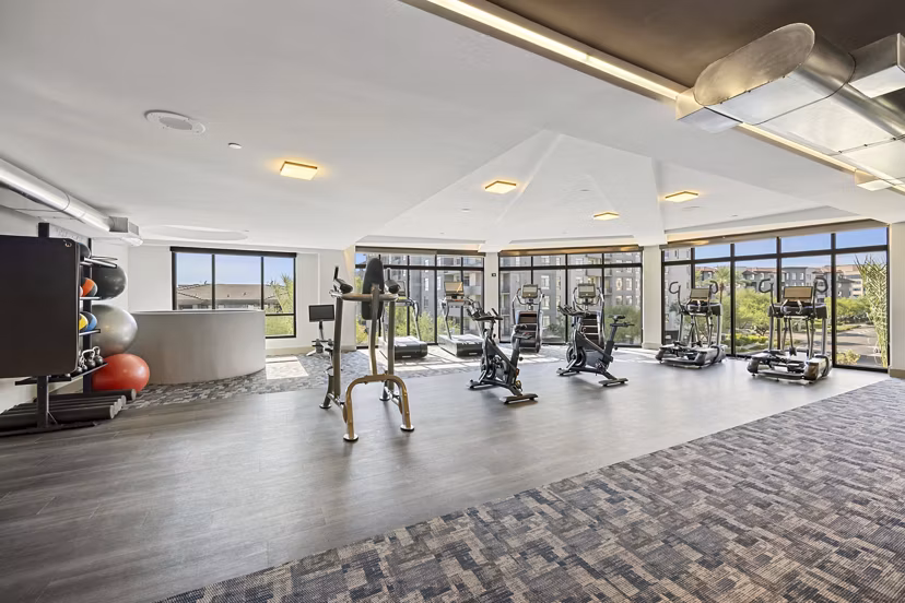 Yoga and spin studio with modern equipment at Soltra at Kierland Apartments Perfect space for fitness enthusiasts seeking luxury amenities