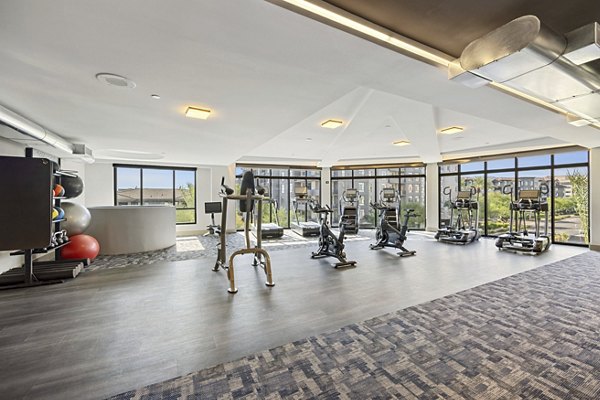 Yoga and spin studio with modern equipment at Soltra at Kierland Apartments Perfect space for fitness enthusiasts seeking luxury amenities