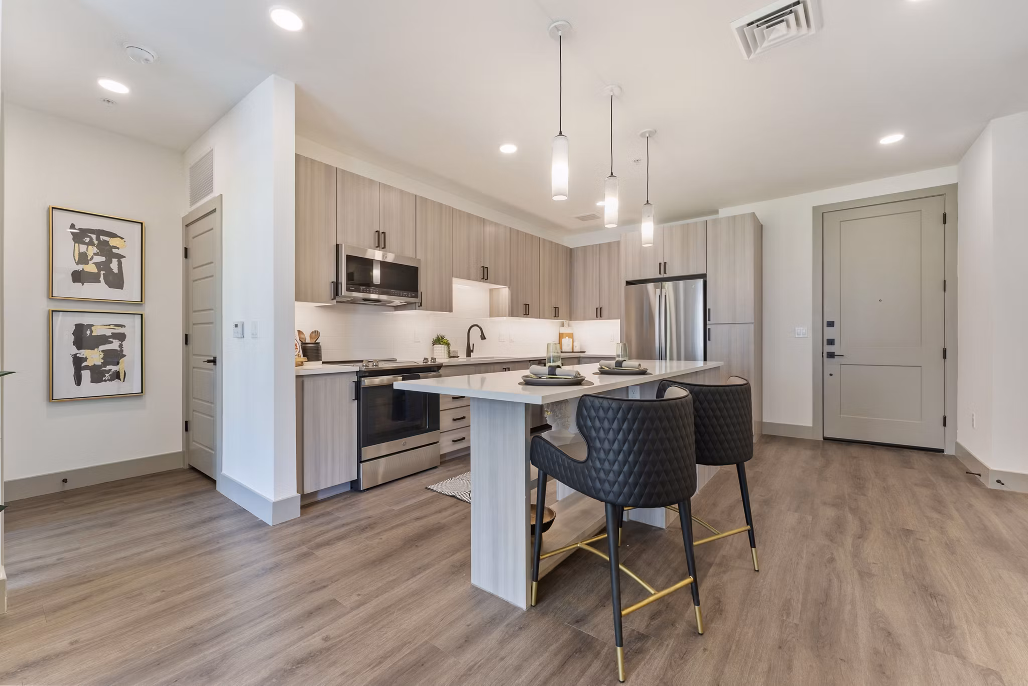 Modern kitchen with stainless steel appliances at Soltra at Kierland Apartments, Greystar luxury community in Scottsdale