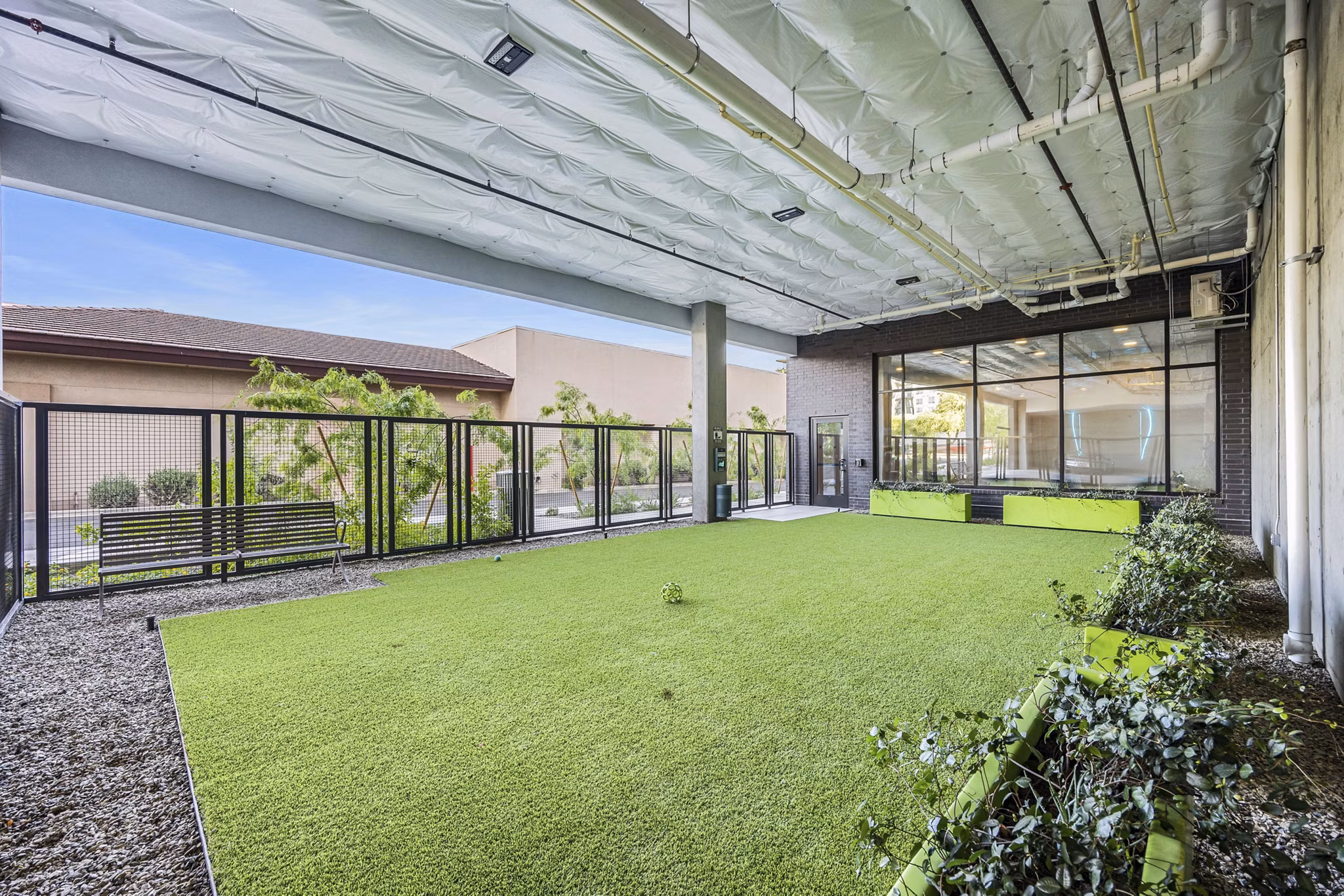 Dog park featuring agility equipment at Soltra at Kierland Apartments, luxury pet-friendly living near Scottsdale