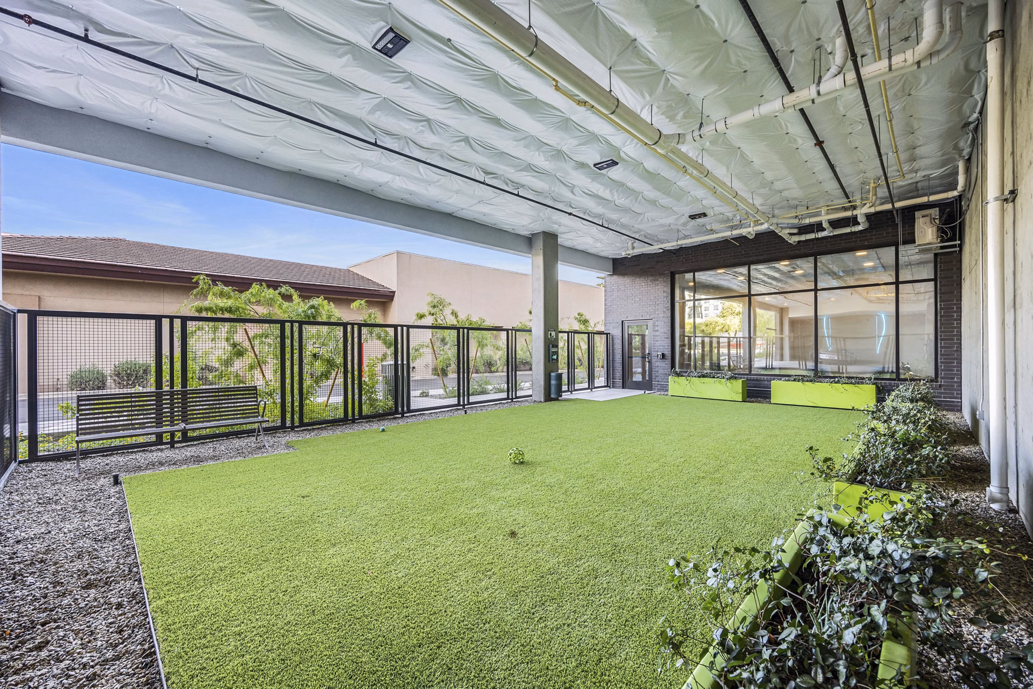 Dog park featuring agility equipment at Soltra at Kierland Apartments, luxury pet-friendly living near Scottsdale