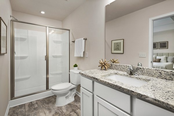 Modern bathroom with sleek fixtures at Townes at Hamilton Apartments