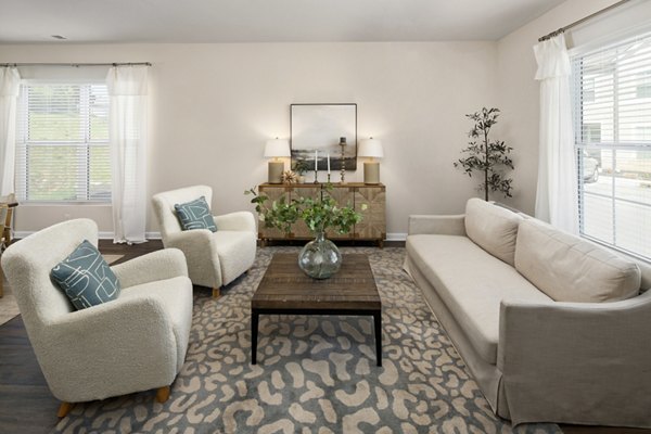 Modern living room with stylish decor at Townes at Hamilton Apartments