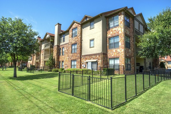 exterior at Olympus Team Ranch Apartments