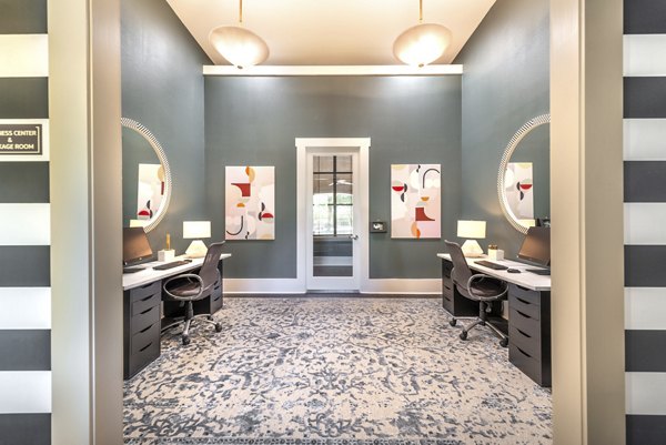 Modern clubhouse featuring spacious lounge and game room at Olympus Team Ranch Apartments, ideal for luxury living and social gatherings