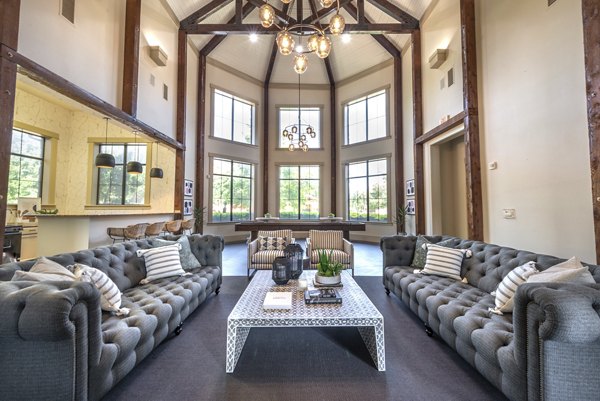 Elegant clubhouse featuring modern decor at Olympus Team Ranch Apartments
