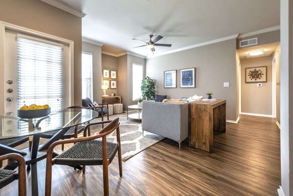 Stylish dining area with modern decor at Olympus Team Ranch Apartments in luxury community