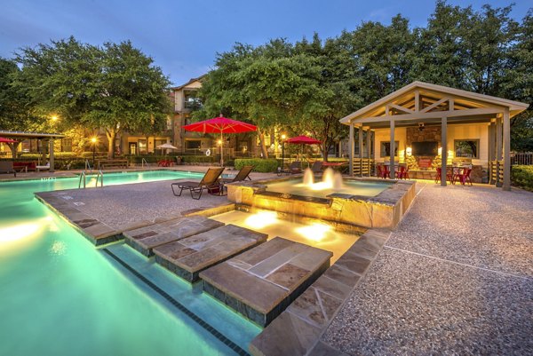 Olympus Team Ranch: Luxury pool with sundeck and lounge chairs, perfect for relaxation and recreation