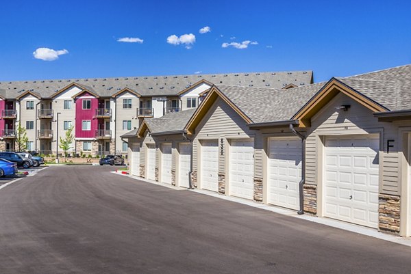 building/exterior/ garage/covered parking at Retreat at Patriot Park Apartments