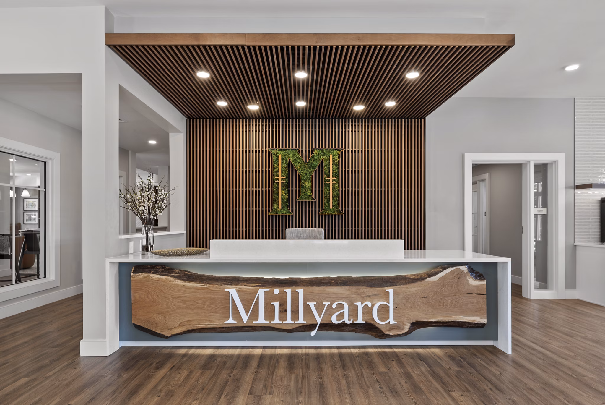 Clubhouse featuring modern seating and decor at Millyard at Meadow Commons Apartments