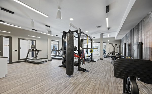 State-of-the-art fitness center with modern equipment at Millyard at Meadow Commons Apartments