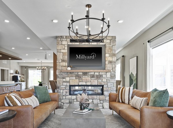 Spacious living room with modern decor in Millyard at Meadow Commons Apartments