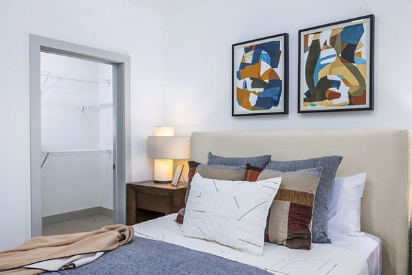 Spacious bedroom with modern decor in The Premier Apartments offering luxury living