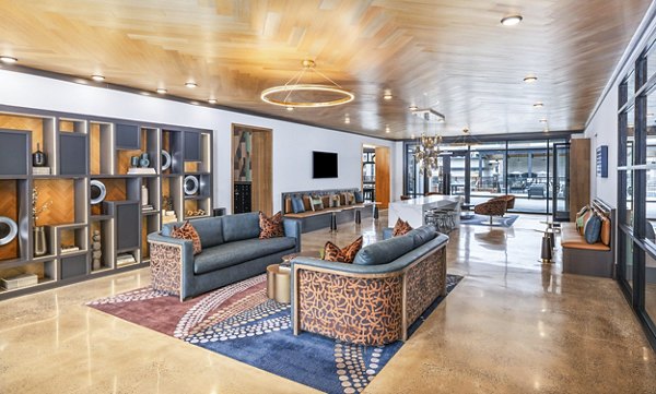 Clubhouse lobby with modern seating and elegant decor in The Premier Apartments, a luxury living community