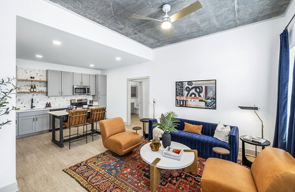 Stylish living room with plush seating and modern decor in The Premier Apartments