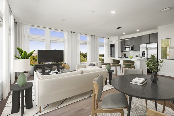 Clubhouse business center with modern workstations at Mira Raleigh Apartments