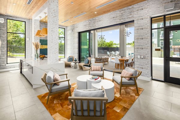 Modern clubhouse with sleek furnishings at Queens Wedgewood Houston Apartments