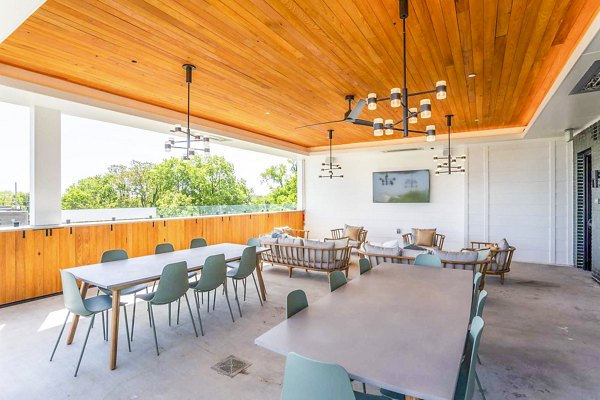 Cozy patio with city view at Queens Wedgewood Houston Apartments