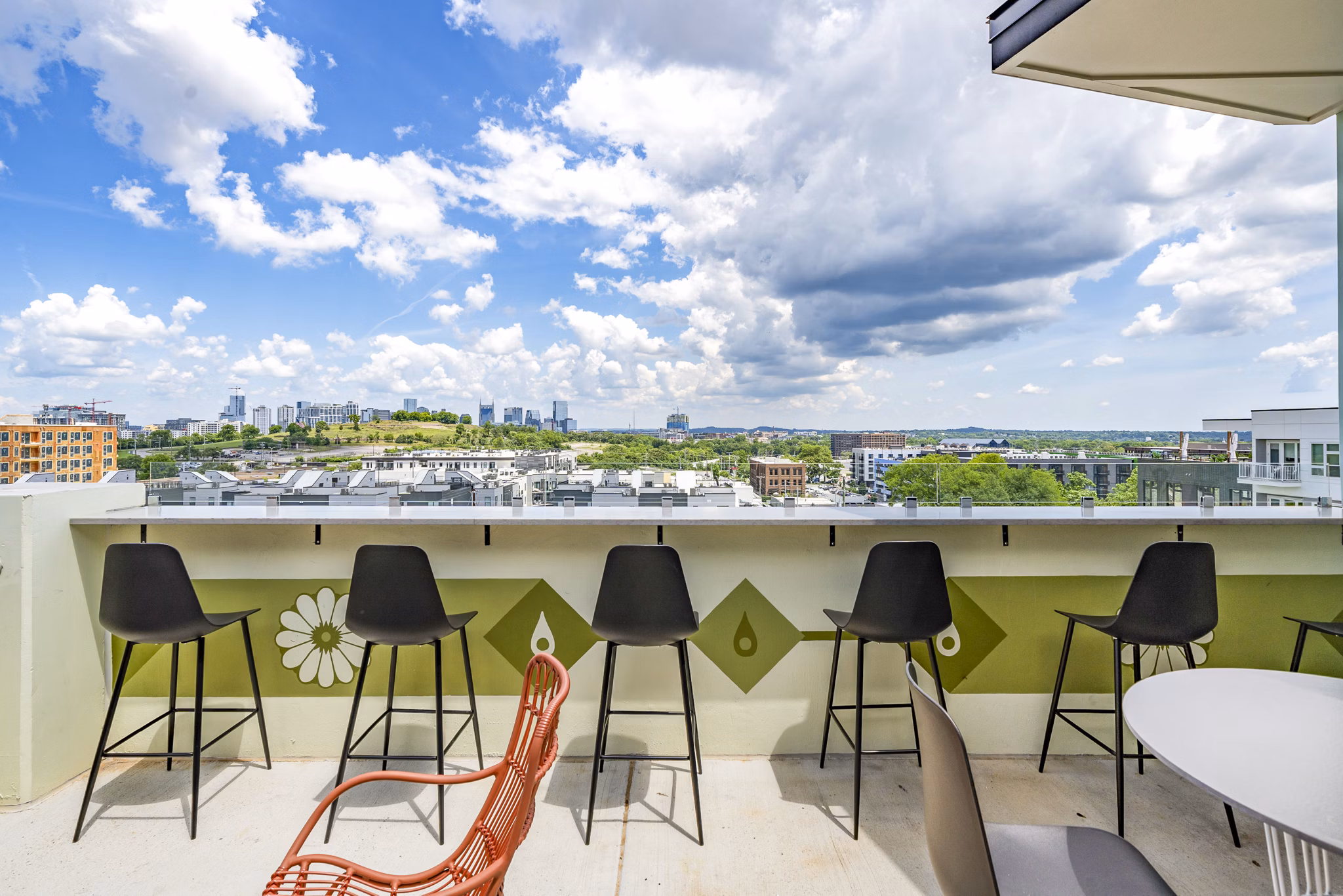 Chic patio balcony at Queens Wedgewood Houston Apartments overlooking vibrant city views