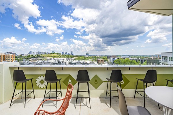 Chic patio balcony at Queens Wedgewood Houston Apartments overlooking vibrant city views